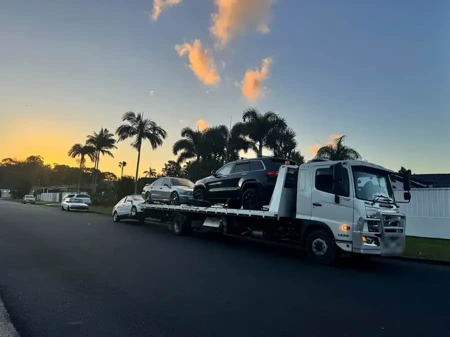 The A1 tow truck loaded at sunset on a Brisbane street